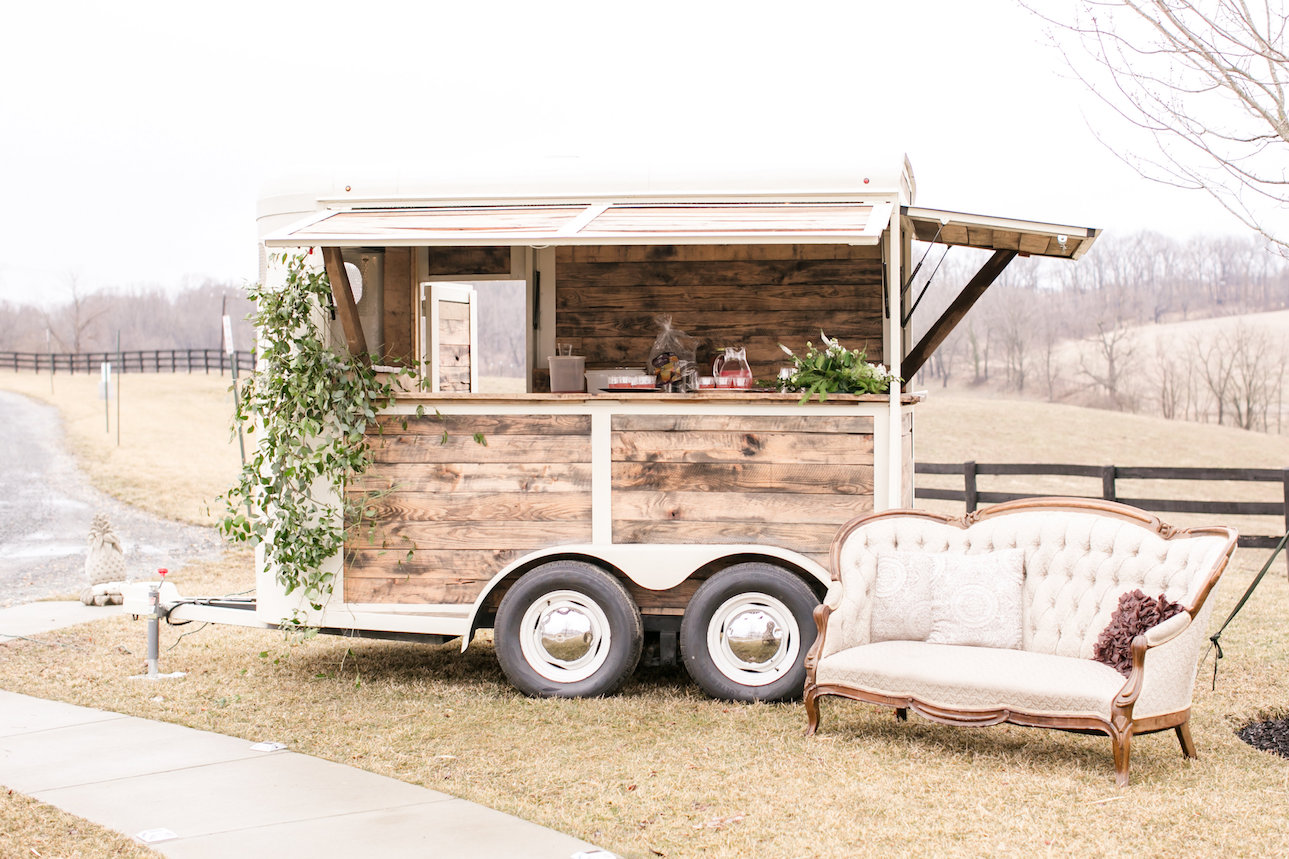 Hitched bar, a standard horse trailer turned rustic bar on wheels