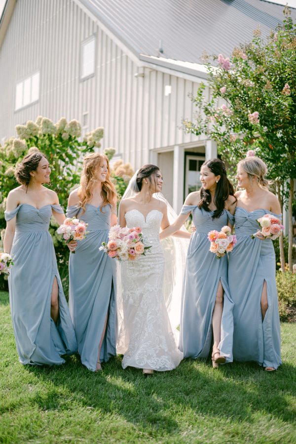 bridesmaids in blue gowns